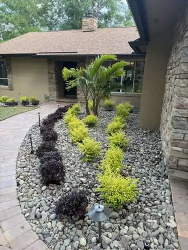 Front Yard Landscape Design, Sod, and Paver Hardscape in Lake Mary