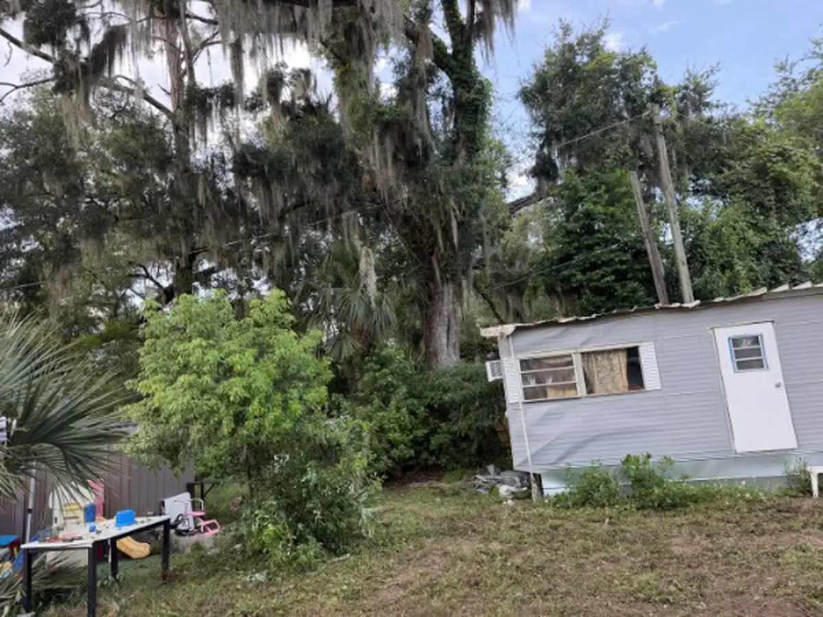 Yard cleared and home intact after fallen oak removal in Orange City, FL