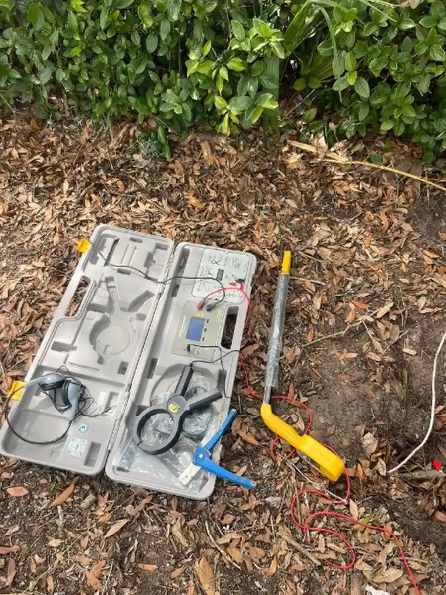 During: exposed low voltage valve wiring and PVC fittings in an open repair trench in Sanford