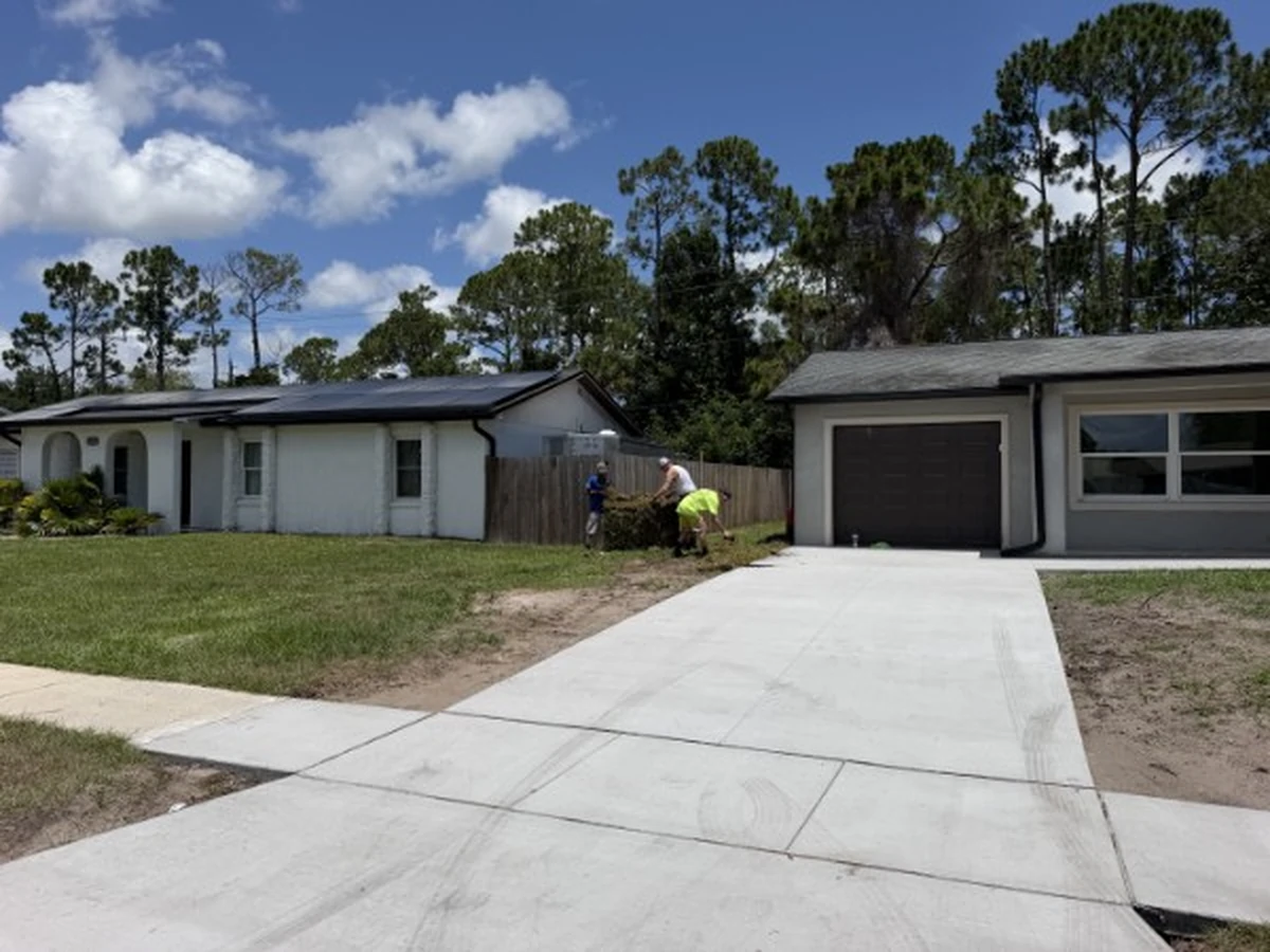 Fresh Bahia sod laid across a Port Orange front yard